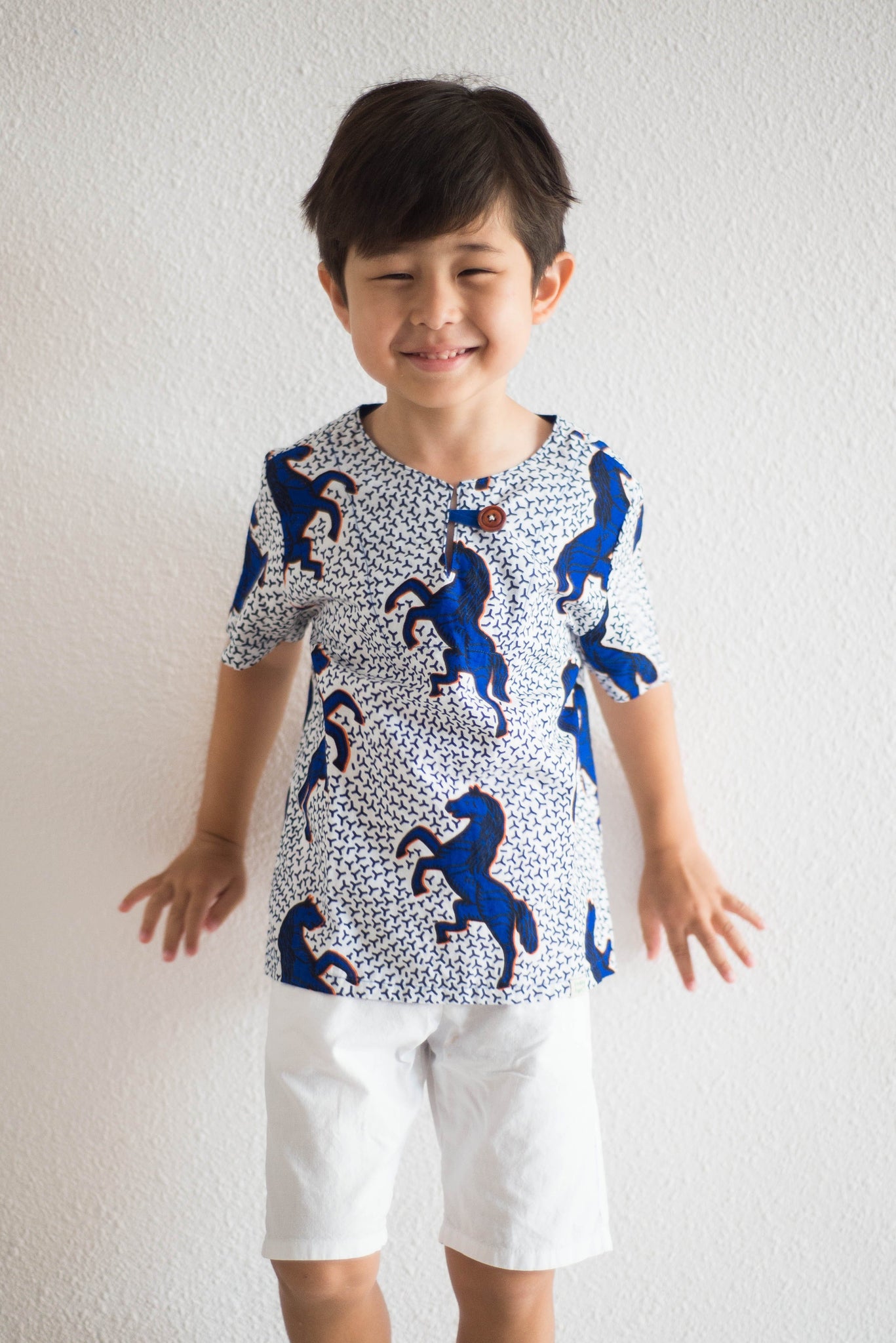 Children's designer clothing made with african wax batik
